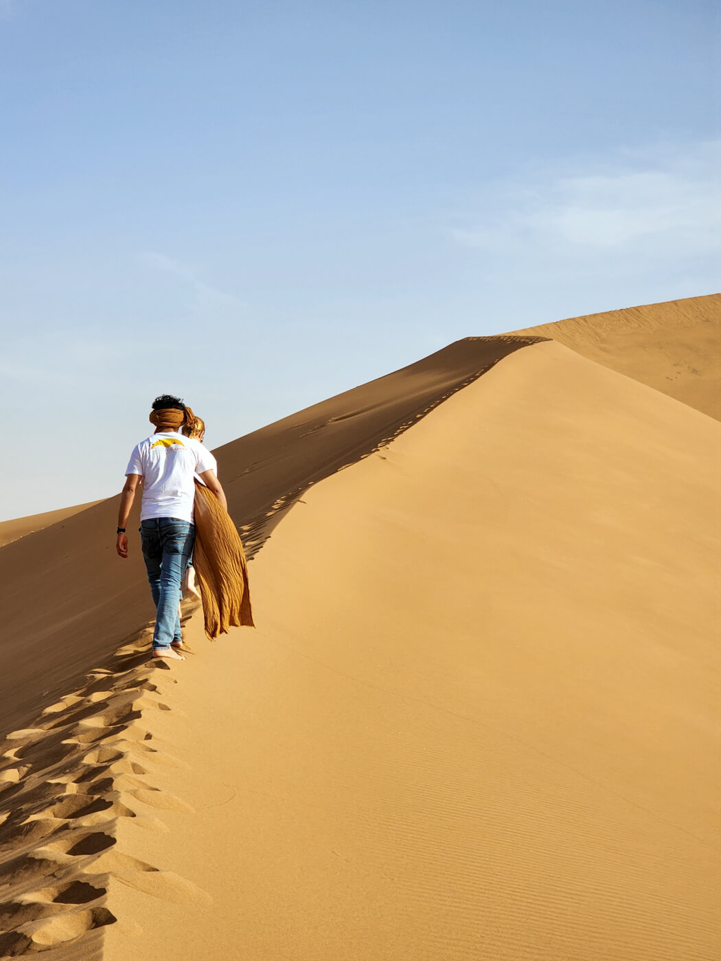 Featured image for “Walking up the Dunes in Chegaga”