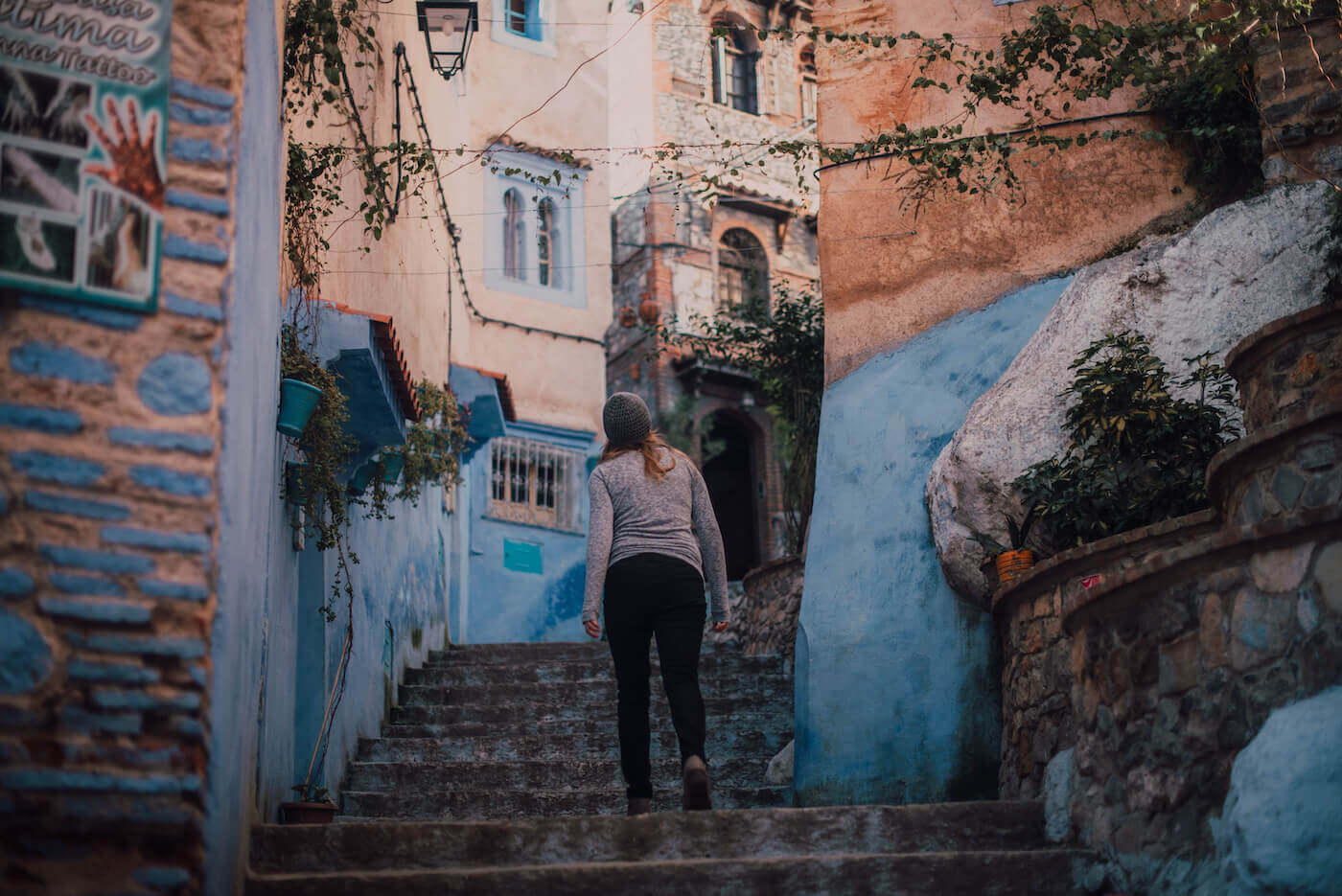 Woman walking in streets of Chefchaouen
