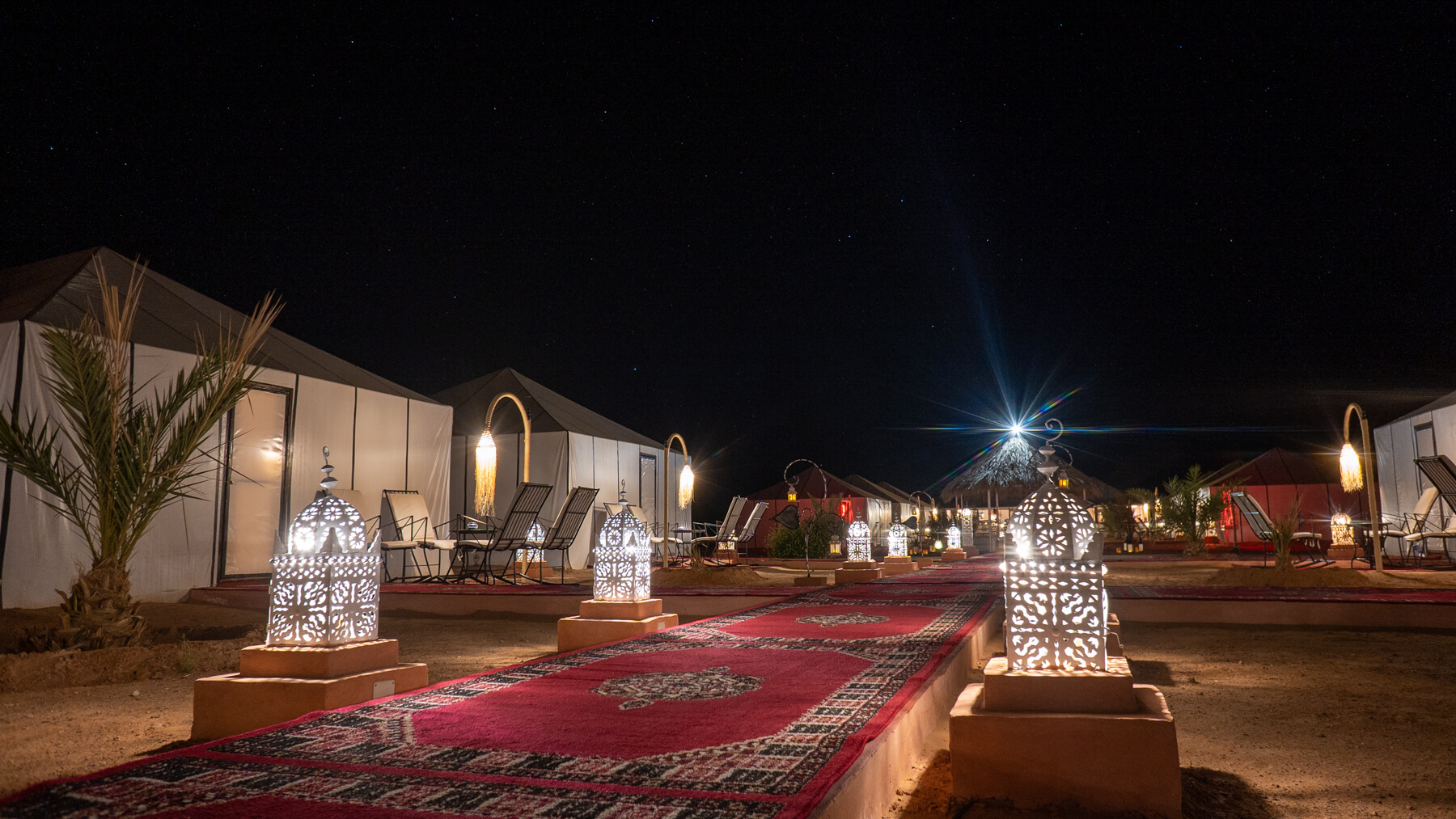 Berber-style desert camp in Erg Chebbi, Merzouga, Morocco at night under stars