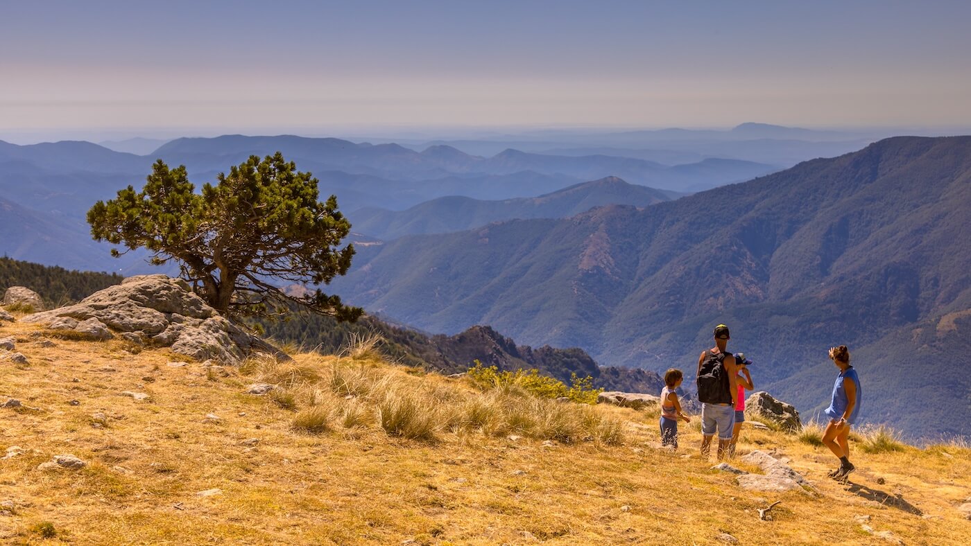Family hiking in High Atlas Mountains in September